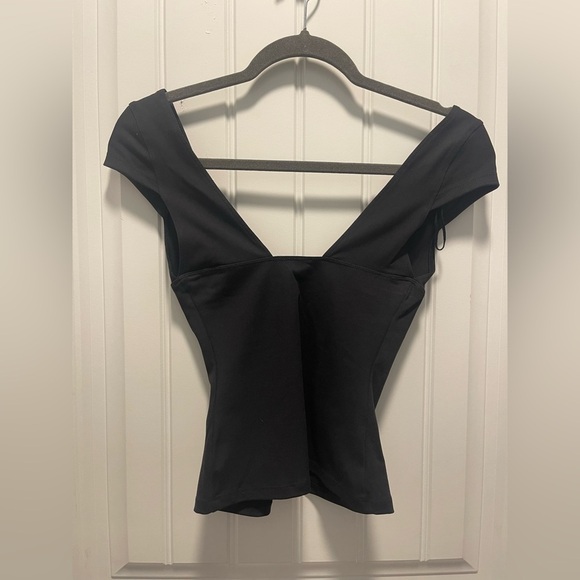 Intimately Free People
Womens size XS 
NWT 

Elegant Black Women's Top - Picture 2 of 3